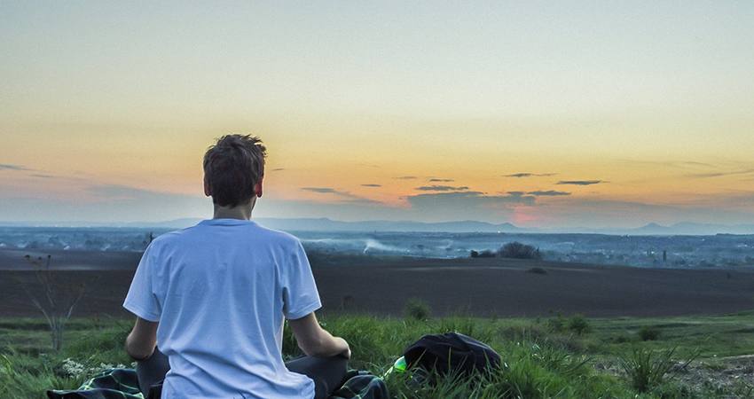 How to become a caregiver: Man meditating