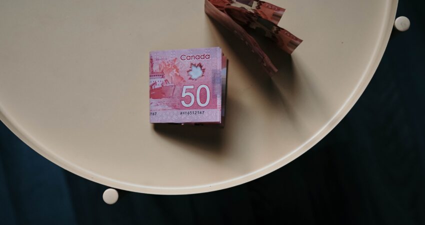 100 banknote on white round table